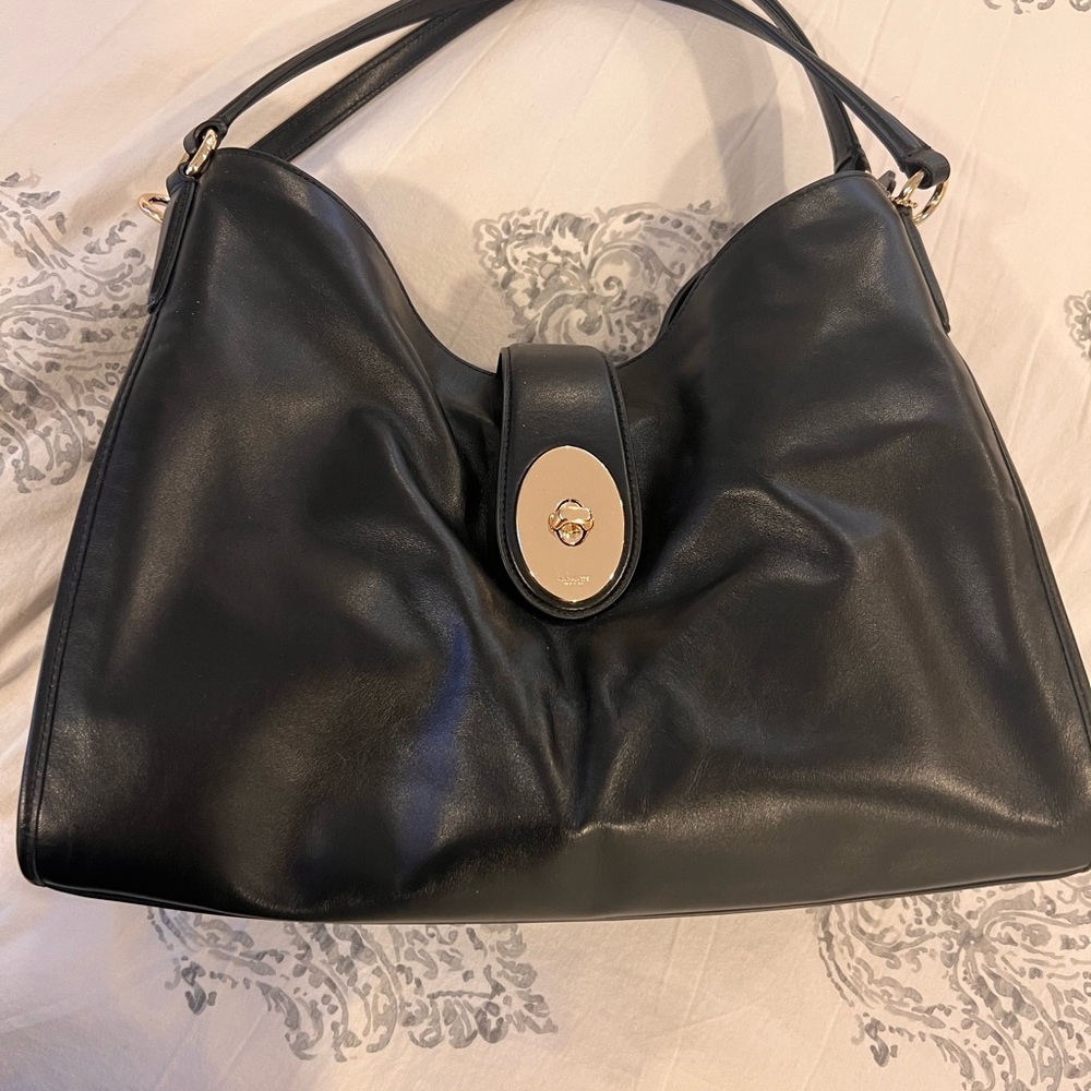 Black leather Coach handbag 
New no tags
